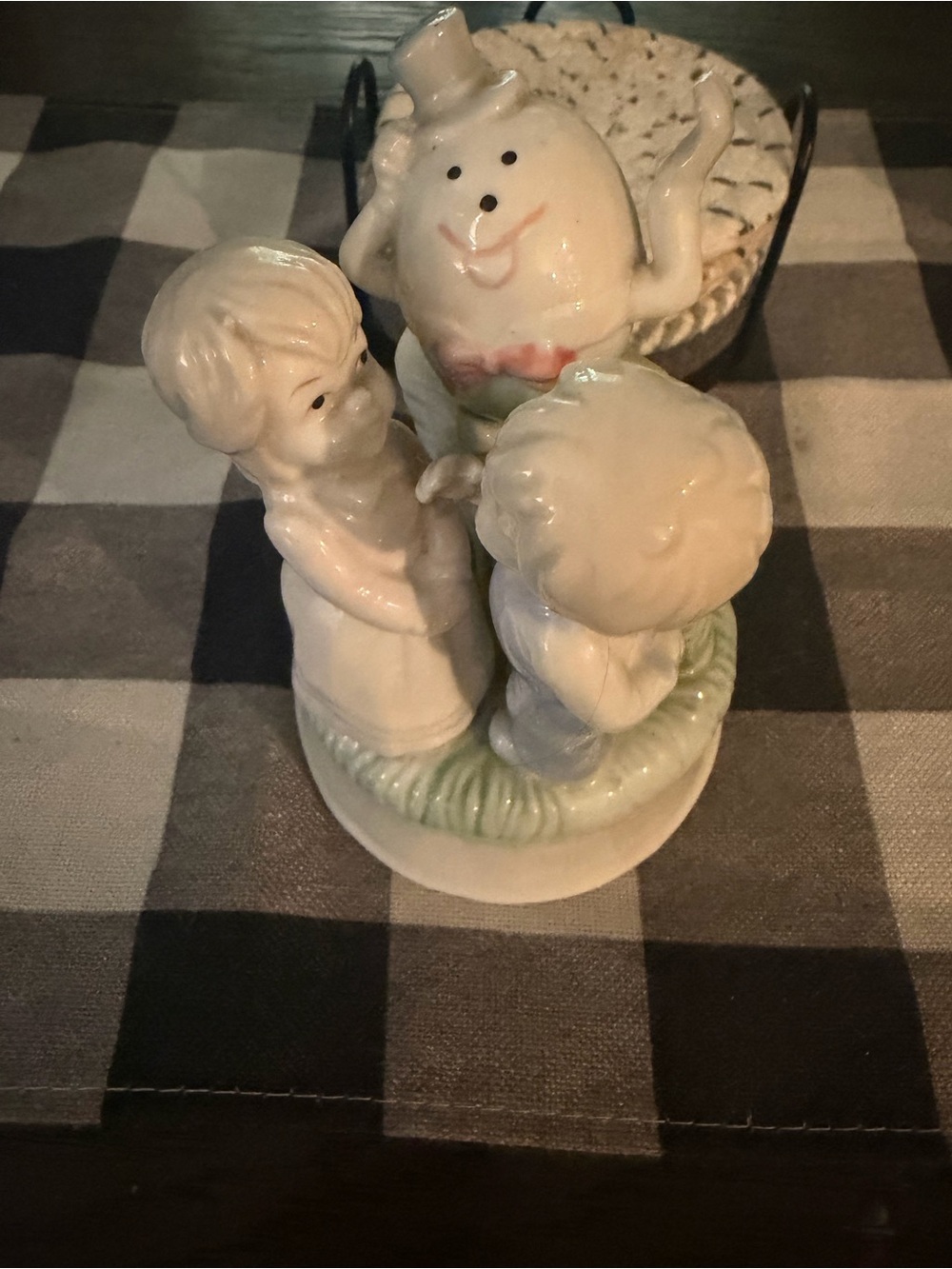 vintage ceramic nursery rhyme music box featuring Humpty Dumpty and two children
